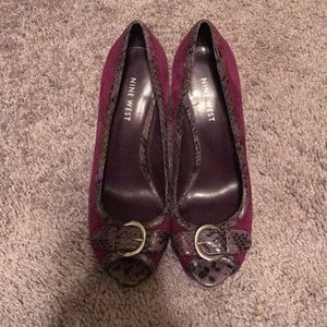 Purple snakeskin peep toe pumps